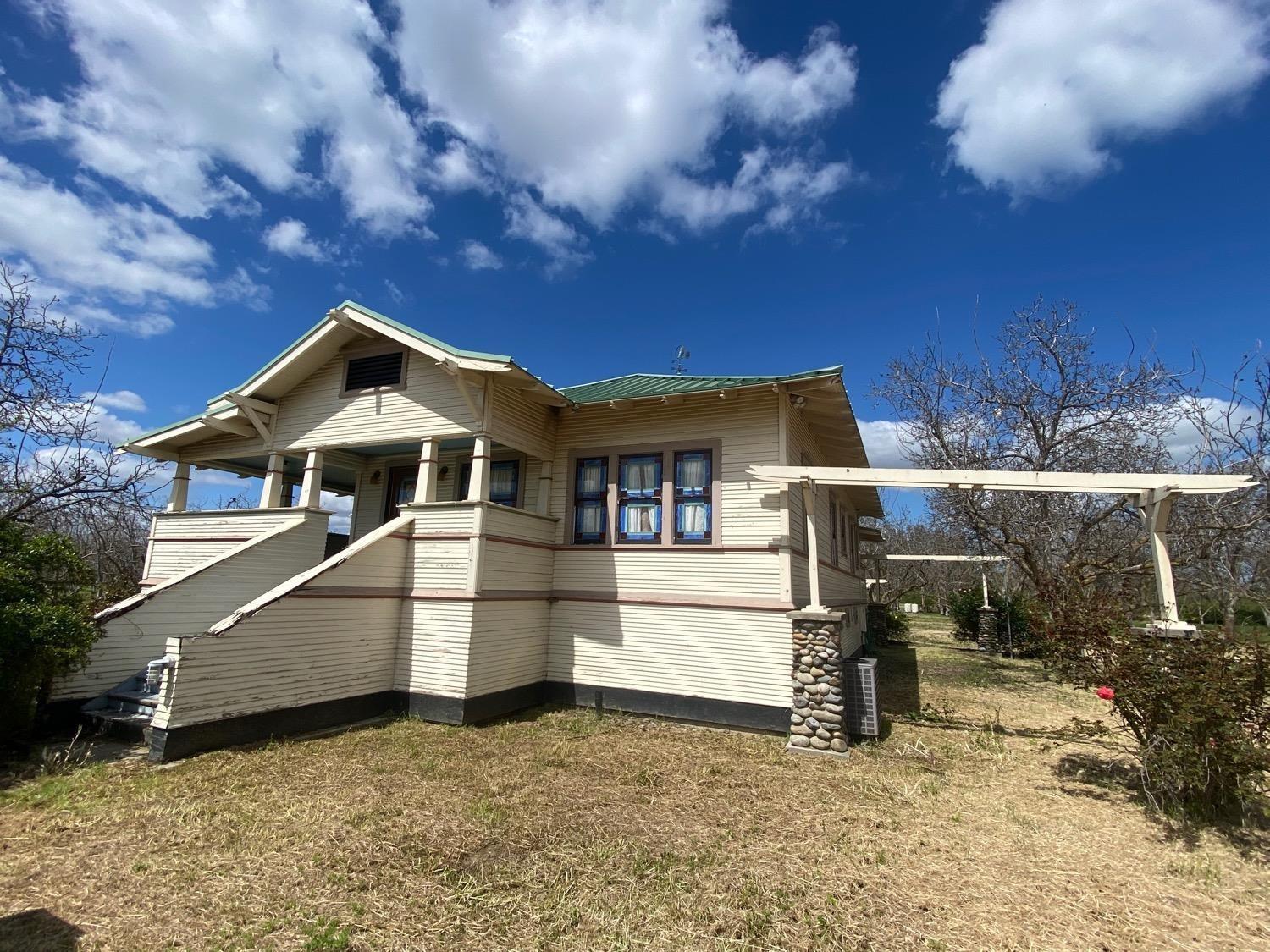 700 Wellsford Road Modesto, CA 95357 - Photo 23 of 47 a front view of a house with a yard