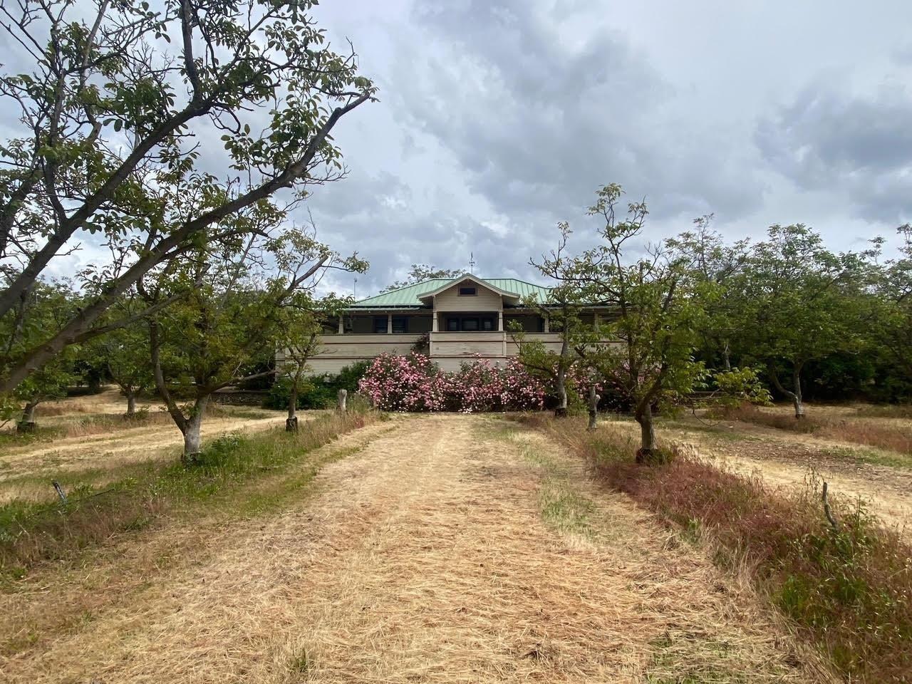 700 Wellsford Road Modesto, CA 95357 - Photo 3 of 47 a front view of a house with a yard and garage