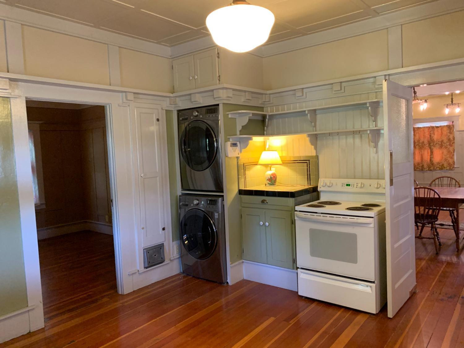 700 Wellsford Road Modesto, CA 95357 - Photo 36 of 47 a kitchen with stainless steel appliances granite countertop a stove and a refrigerator