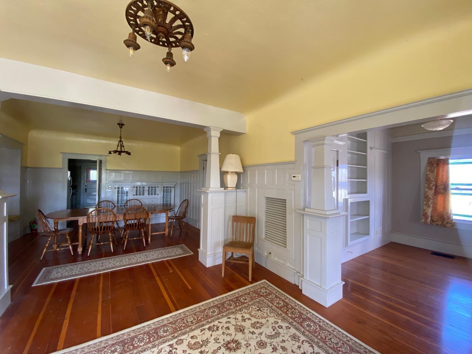 700 Wellsford Road Modesto, CA 95357 - Photo 9 of 47 a living room with furniture dining table and wooden floor