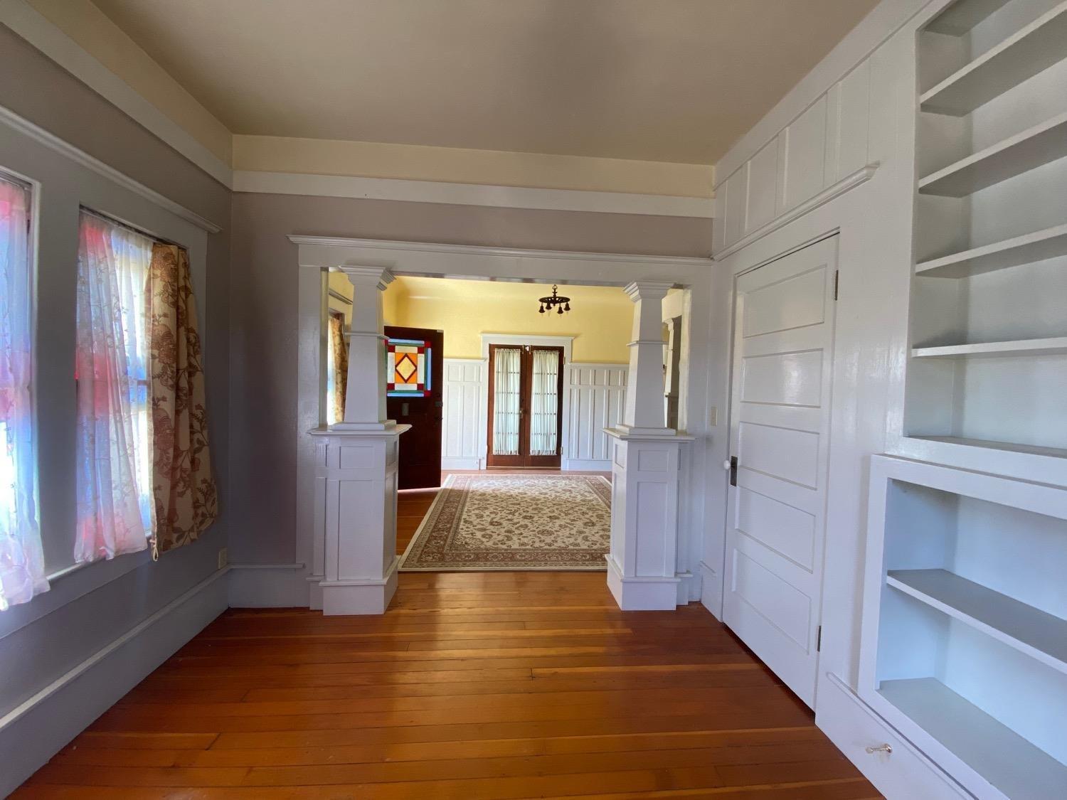 700 Wellsford Road Modesto, CA 95357 - Photo 10 of 47 a view of gallery with wooden floor and windows