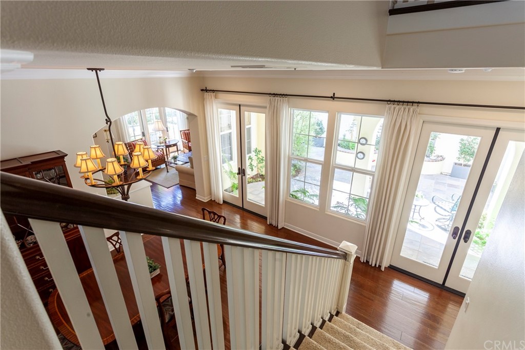 21246 Baeza Circle Huntington Beach, CA 92648 - Photo 16 of 49 a view of an entryway with wooden floor