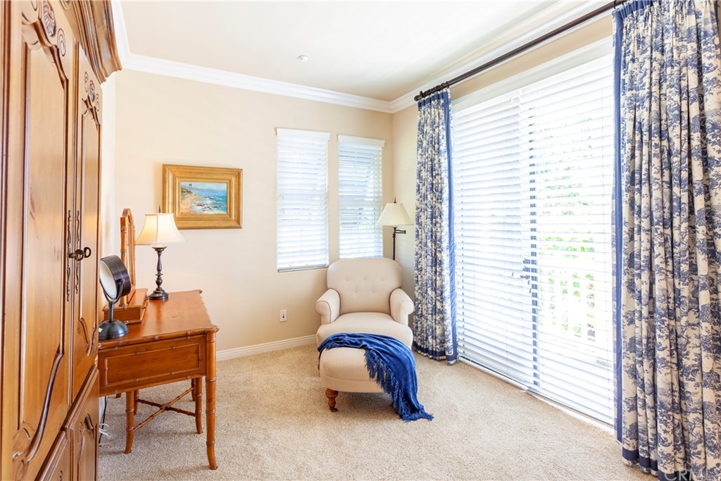 21246 Baeza Circle Huntington Beach, CA 92648 - Photo 23 of 49 a bedroom with furniture and a window