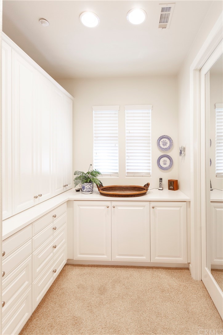 21246 Baeza Circle Huntington Beach, CA 92648 - Photo 24 of 49 a spacious bathroom with sinks mirror and double