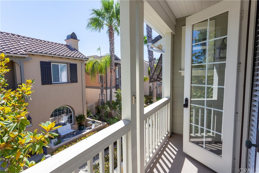 21246 Baeza Circle Huntington Beach, CA 92648 - Photo 29 of 49 a view of a house with a porch