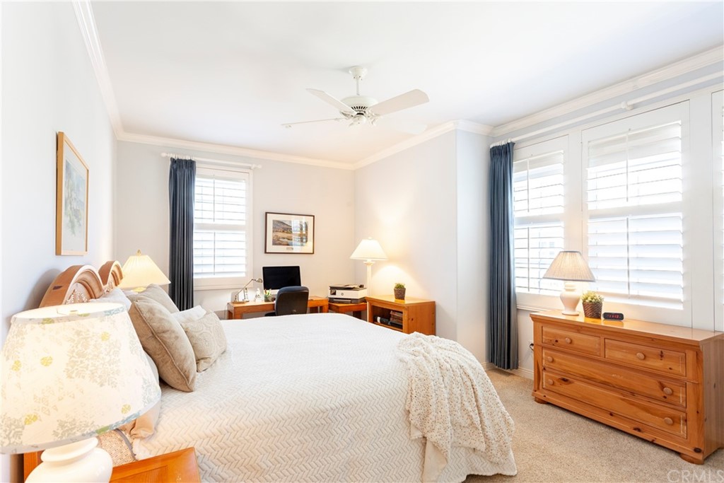 21246 Baeza Circle Huntington Beach, CA 92648 - Photo 30 of 49 a bedroom with a bed and a window