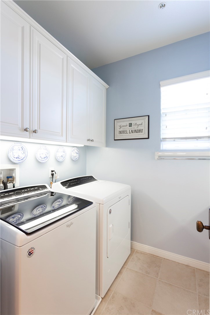 21246 Baeza Circle Huntington Beach, CA 92648 - Photo 36 of 49 a utility room with dryer and washer