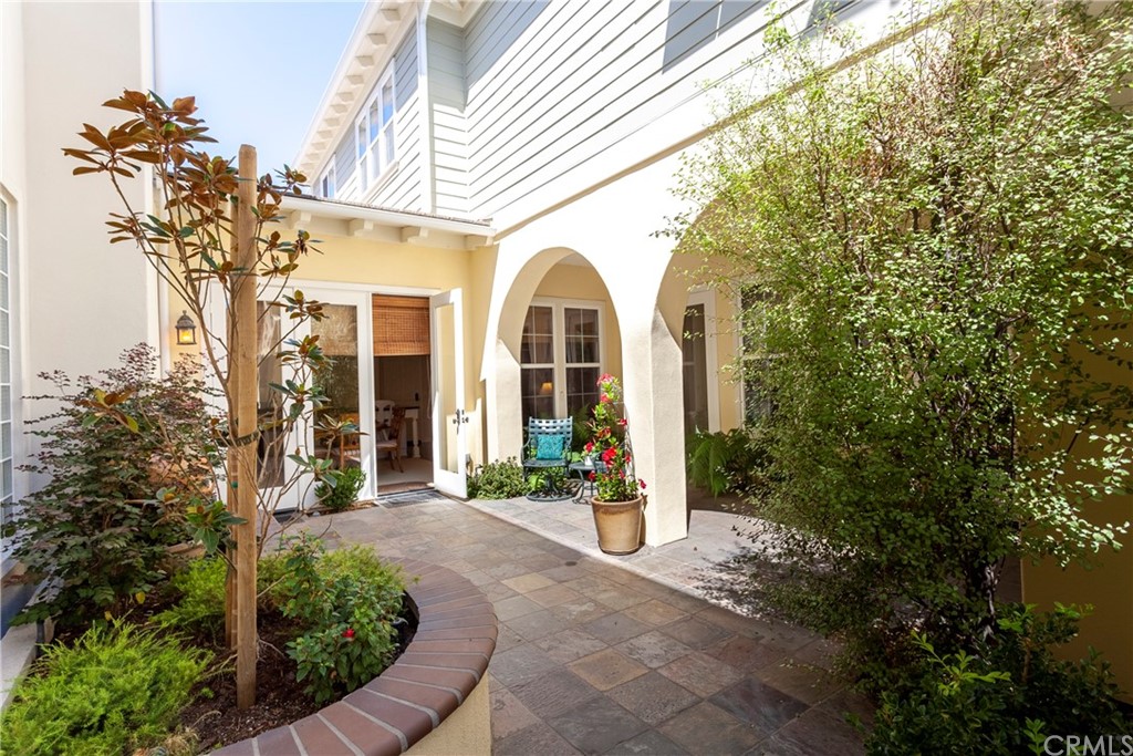21246 Baeza Circle Huntington Beach, CA 92648 - Photo 40 of 49 a front view of a house with garden