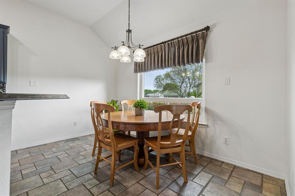 1901 Saw Tooth Court Haslet, TX 76052 - Photo 16 of 38 a view of a dining room with furniture and chandelier