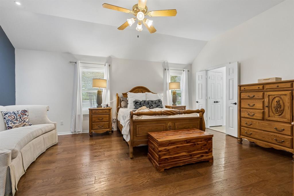 1901 Saw Tooth Court Haslet, TX 76052 - Photo 18 of 38 a bedroom with furniture and wooden floor