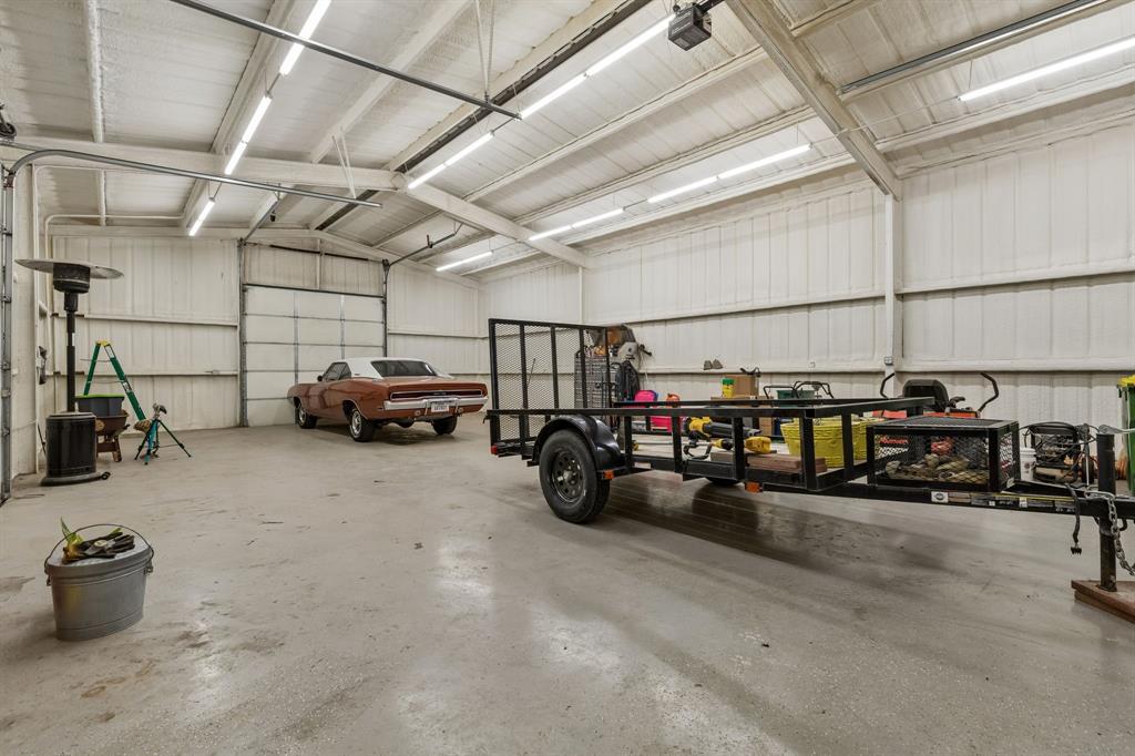 1901 Saw Tooth Court Haslet, TX 76052 - Photo 28 of 38 a view of a garage with storage