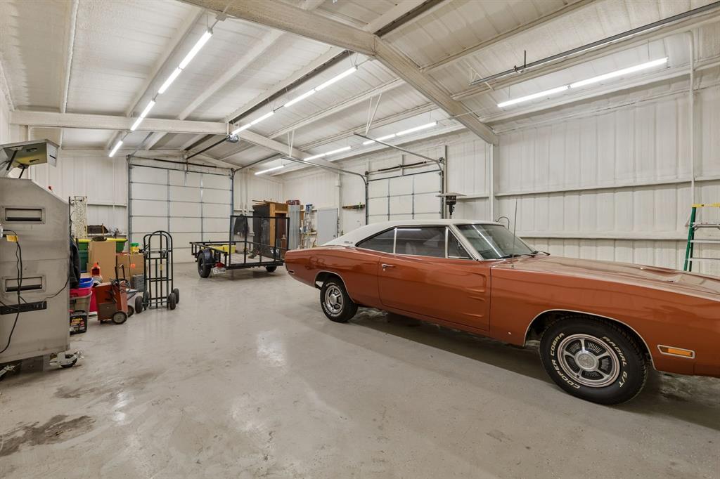 1901 Saw Tooth Court Haslet, TX 76052 - Photo 29 of 38 a car parked in a garage
