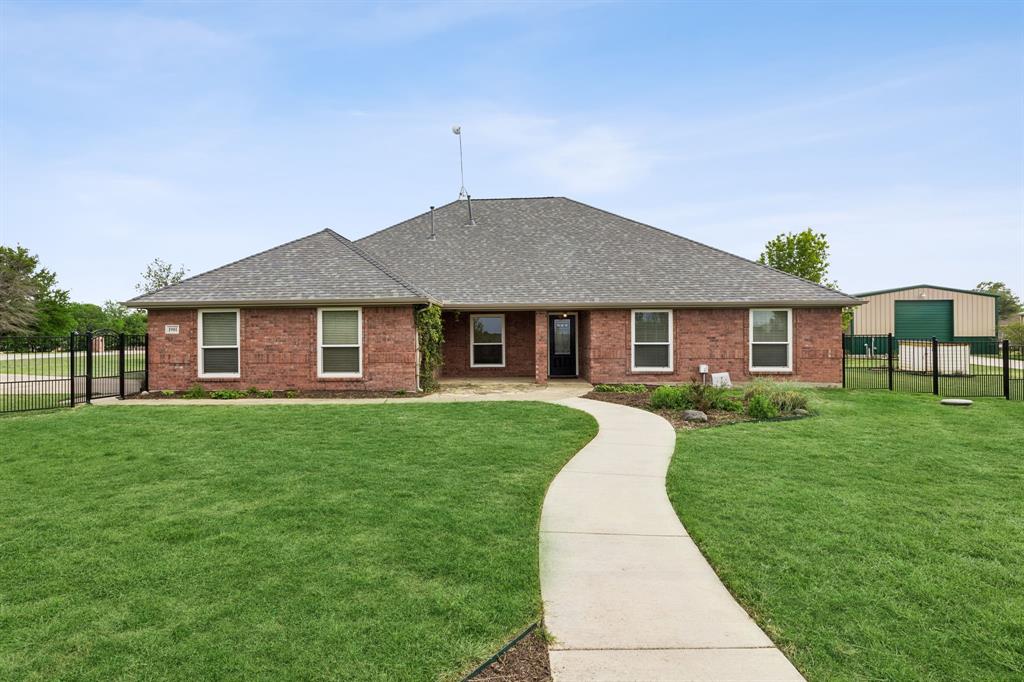 1901 Saw Tooth Court Haslet, TX 76052 - Photo 32 of 38 a front view of a house with a yard