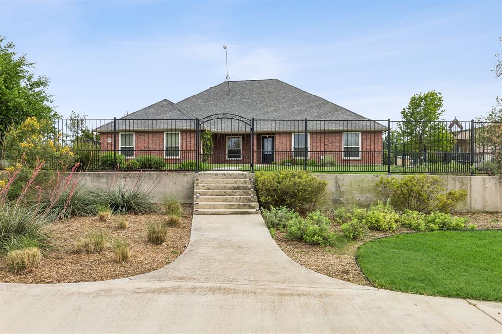 1901 Saw Tooth Court Haslet, TX 76052 - Photo 5 of 38 a front view of a house with a yard