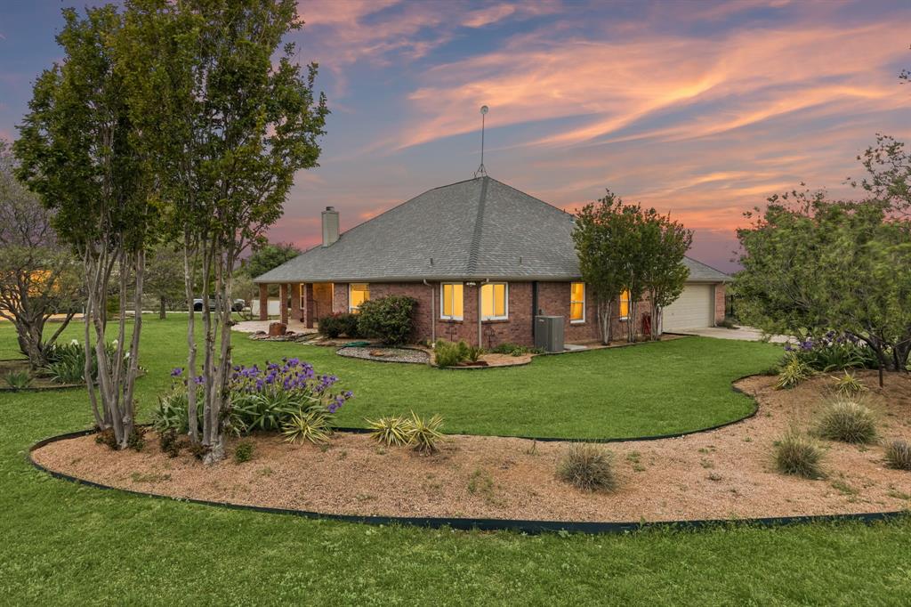 1901 Saw Tooth Court Haslet, TX 76052 - Photo 8 of 38 a view of a house with a yard