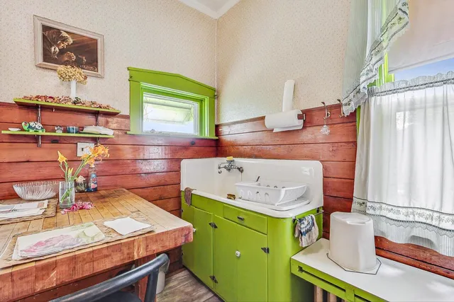 a room with a bed and a table