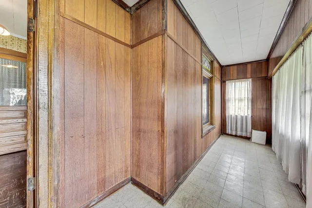 a view of a large mirror with a bathroom