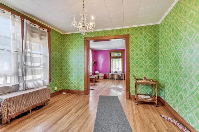 a view of a room with a large windows