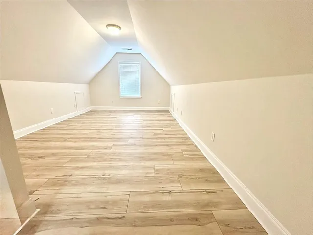 a view of a big room with wooden floor