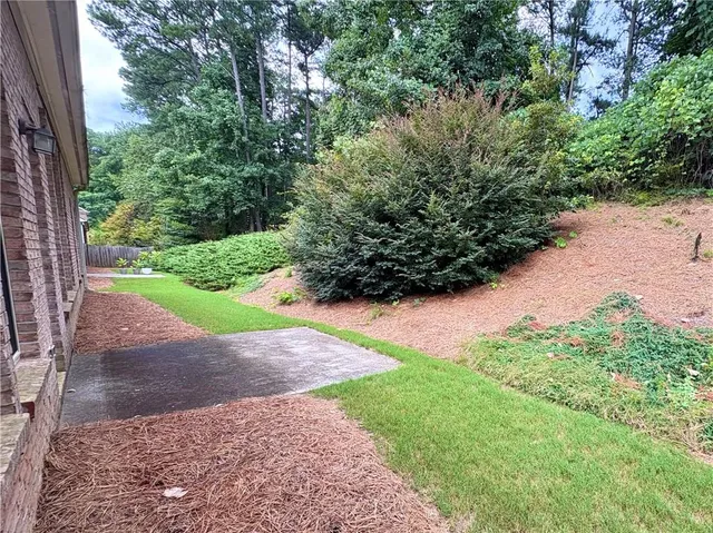 a view of a garden with a pathway