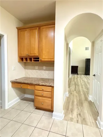 a view of bathroom with bathtub and window