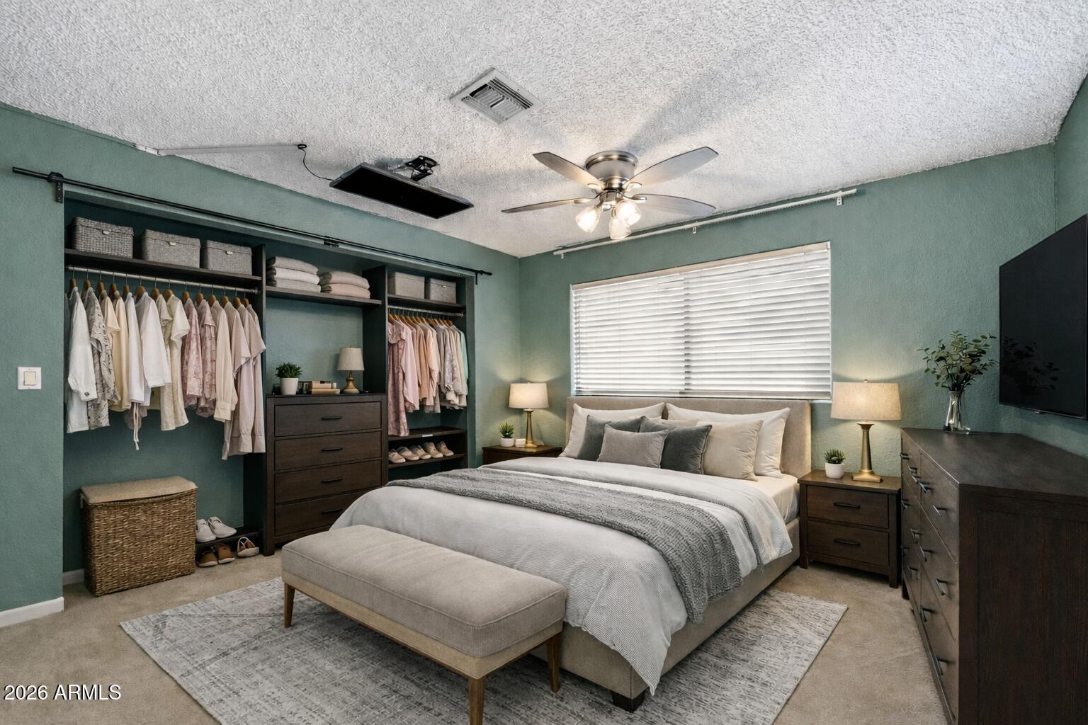 30 East Brown Road, Unit 2070 Mesa, AZ 85201 - Photo 12 of 20 a bedroom with a bed ceiling fan and a window