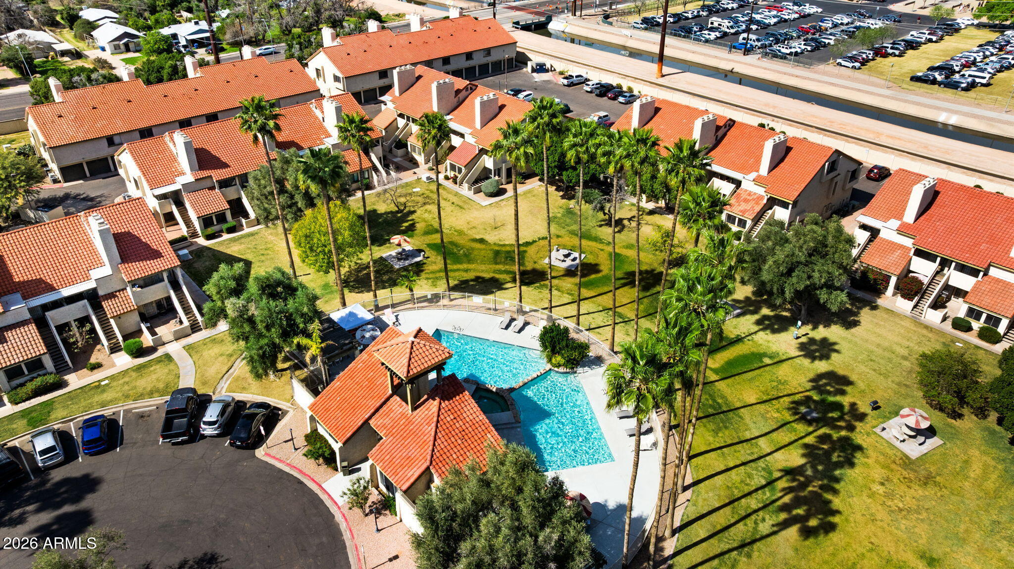 30 East Brown Road, Unit 2070 Mesa, AZ 85201 - Photo 19 of 20 an aerial view of a house with a yard and garden