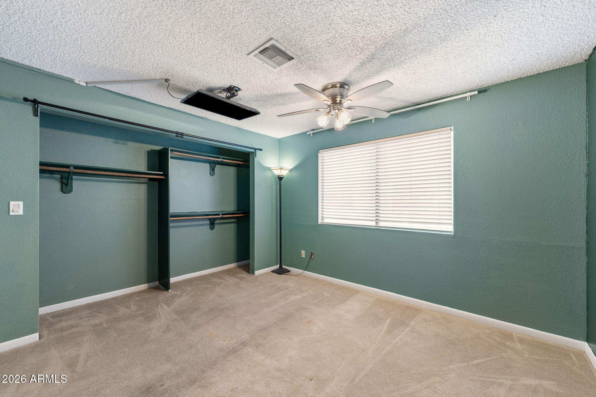 30 East Brown Road, Unit 2070 Mesa, AZ 85201 - Photo 10 of 20 a view of an empty room with a window