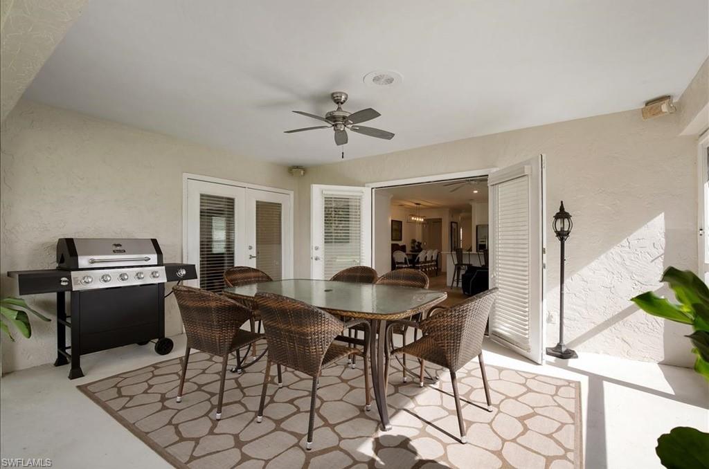 552 105th Avenue North Naples, FL 34108 - Photo 14 of 17 a dining room with furniture and window
