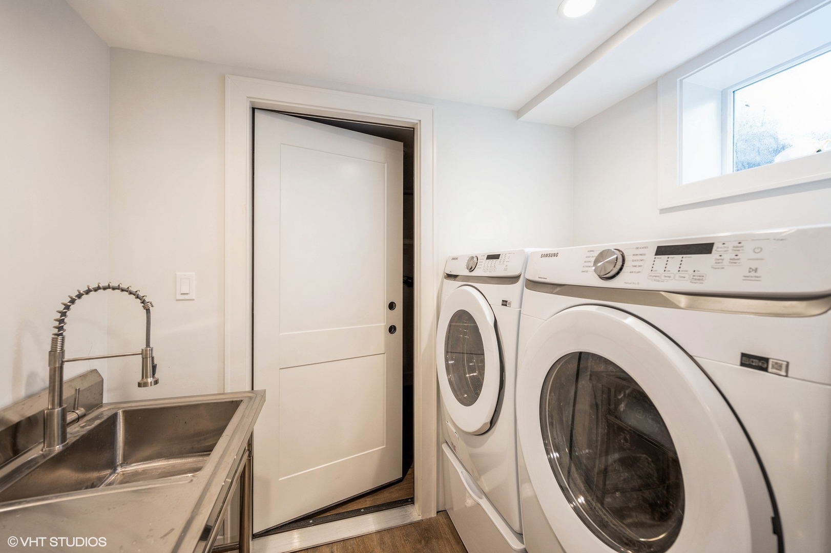 580 North Happ Road Northfield, IL 60093 - Photo 16 of 20 a close view of a sink and washer and dryer