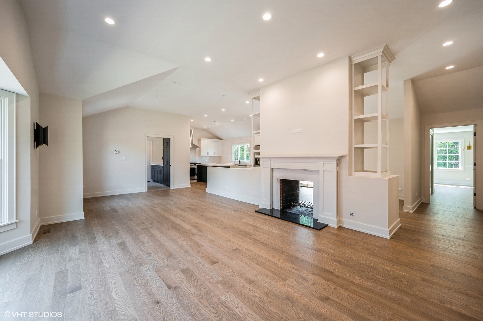 580 North Happ Road Northfield, IL 60093 - Photo 2 of 20 a view of a kitchen with a sink and a fireplace