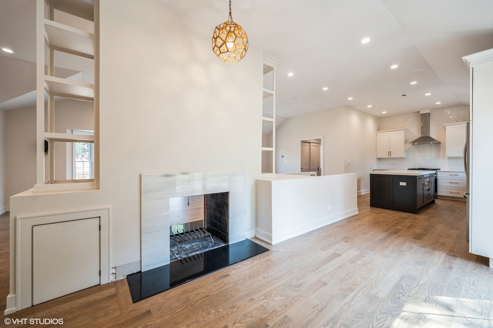 580 North Happ Road Northfield, IL 60093 - Photo 6 of 20 a living room with furniture and a flat screen tv