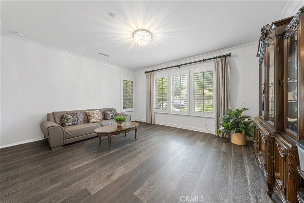 45 Triana Irvine, CA 92618 - Photo 20 of 39 a living room with furniture potted plant and a window