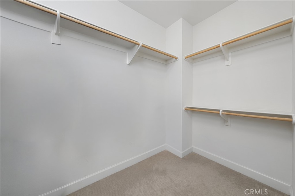 45 Triana Irvine, CA 92618 - Photo 25 of 39 a view of an empty walk in closet