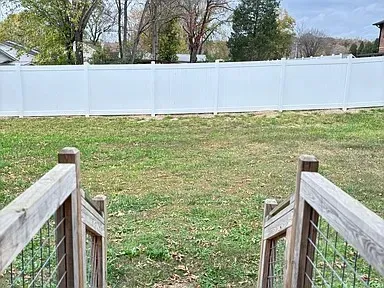 a view of a hardwood and bridge