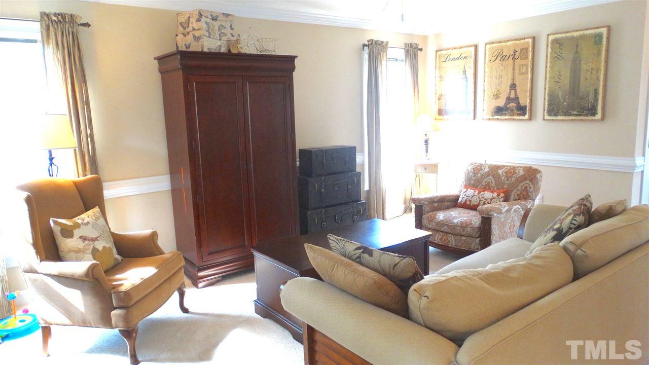 9209 Dawnshire Road Raleigh, NC 27615 - Photo 5 of 25 Cozy up to the family in this amazing room!