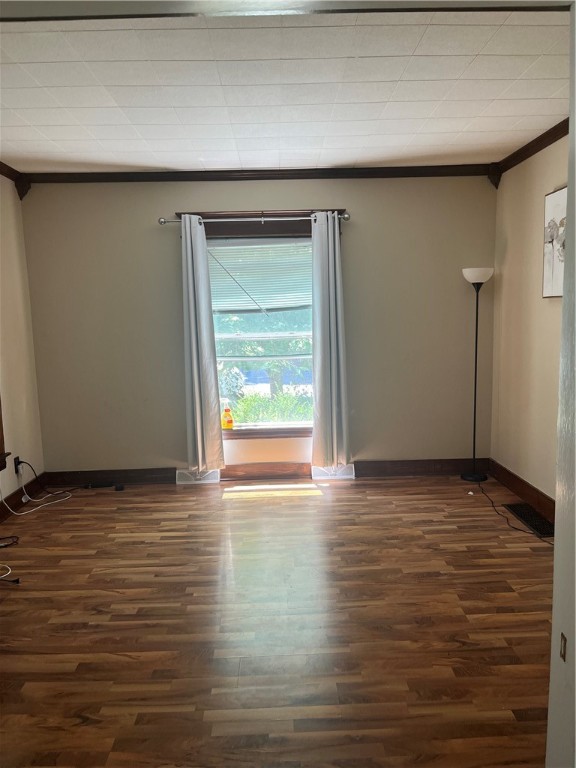 325 East 3rd Street Corning, NY 14830 - Photo 4 of 17 Living room- all original wood moldings.