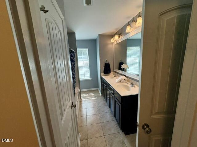 939 Ileagnes Road Raleigh, NC 27603 - Photo 28 of 54 Primary Bath double vanity