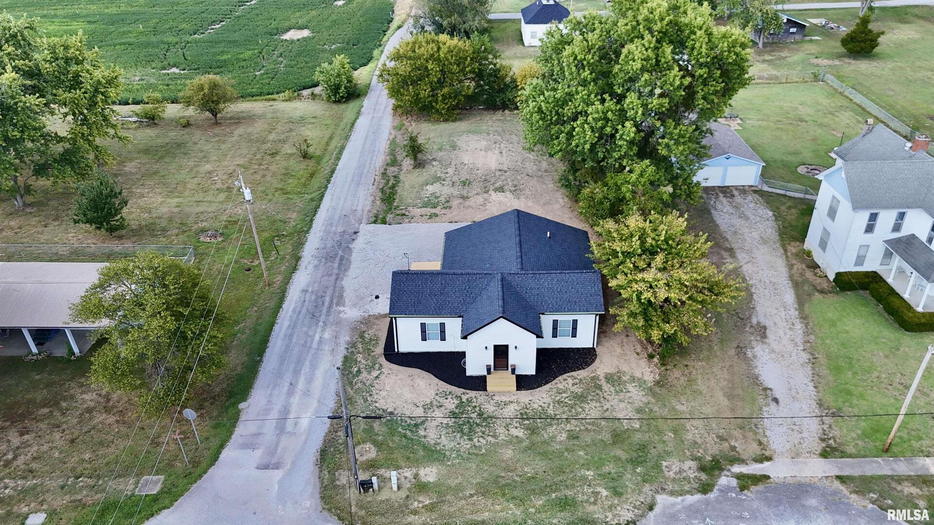 309 West Main Street Ewing, IL 62836 - Photo 2 of 37 an aerial view of a house