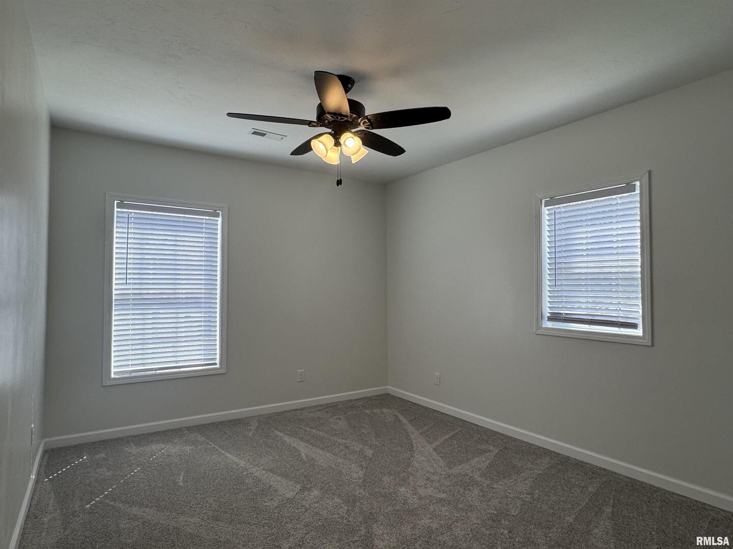 309 West Main Street Ewing, IL 62836 - Photo 22 of 37 a view of an empty room with a window