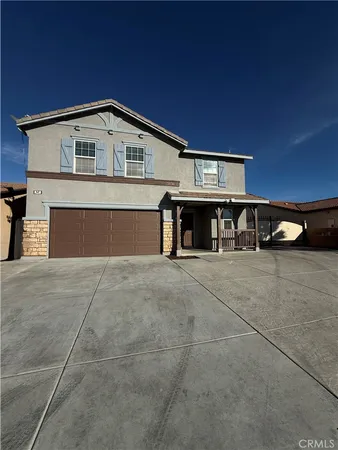 a view of a house with a parking space and parking space