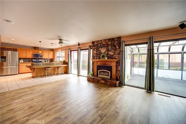 a bedroom with a bed and a dresser in it
