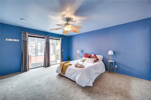 a kitchen with granite countertop cabinets stainless steel appliances and a window