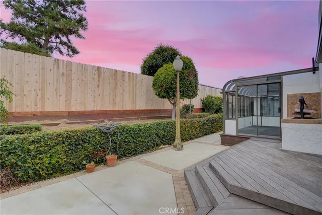 a view of a house with a garden