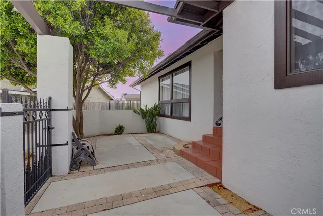 a view of a porch with a garden