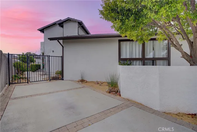 a view of a hallway with seating area