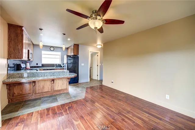 an aerial view of residential house with swimming pool