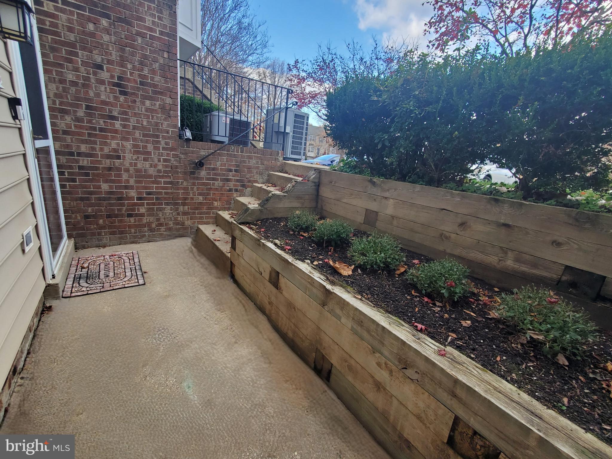 2433 Wentworth Drive Crofton, MD 21114 - Photo 18 of 18 a pathway of a house with a yard
