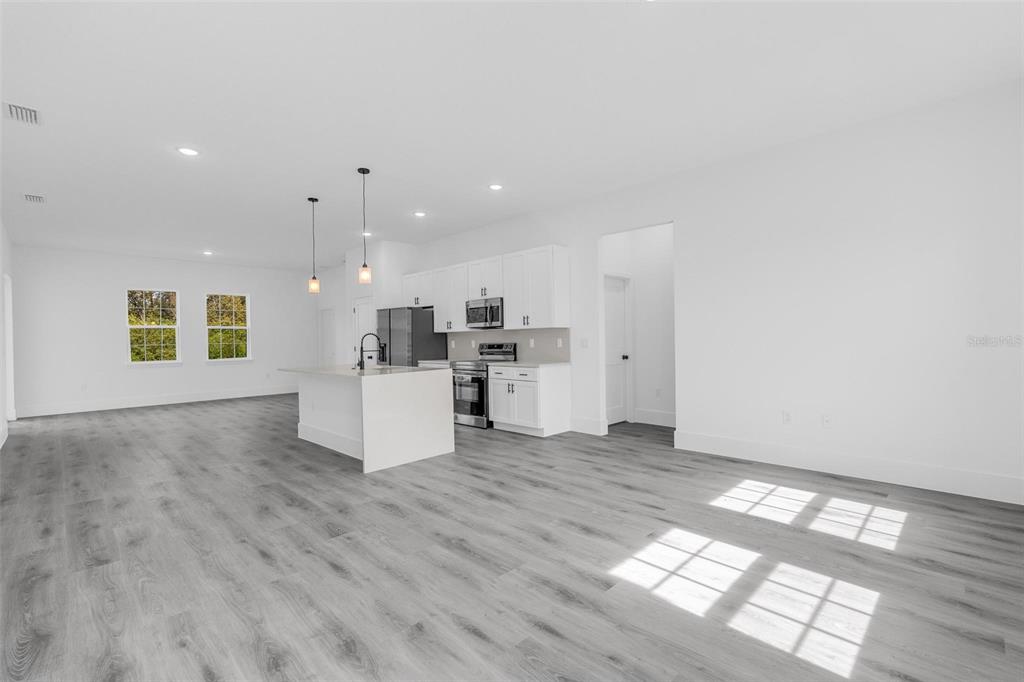 3428 Southwest 165th Loop Ocala, FL 34473 - Photo 13 of 43 a view of kitchen with furniture and window