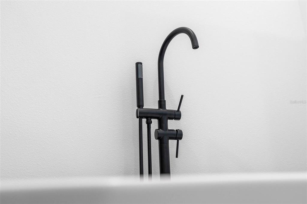 3428 Southwest 165th Loop Ocala, FL 34473 - Photo 32 of 43 a close view of a faucet in the kitchen
